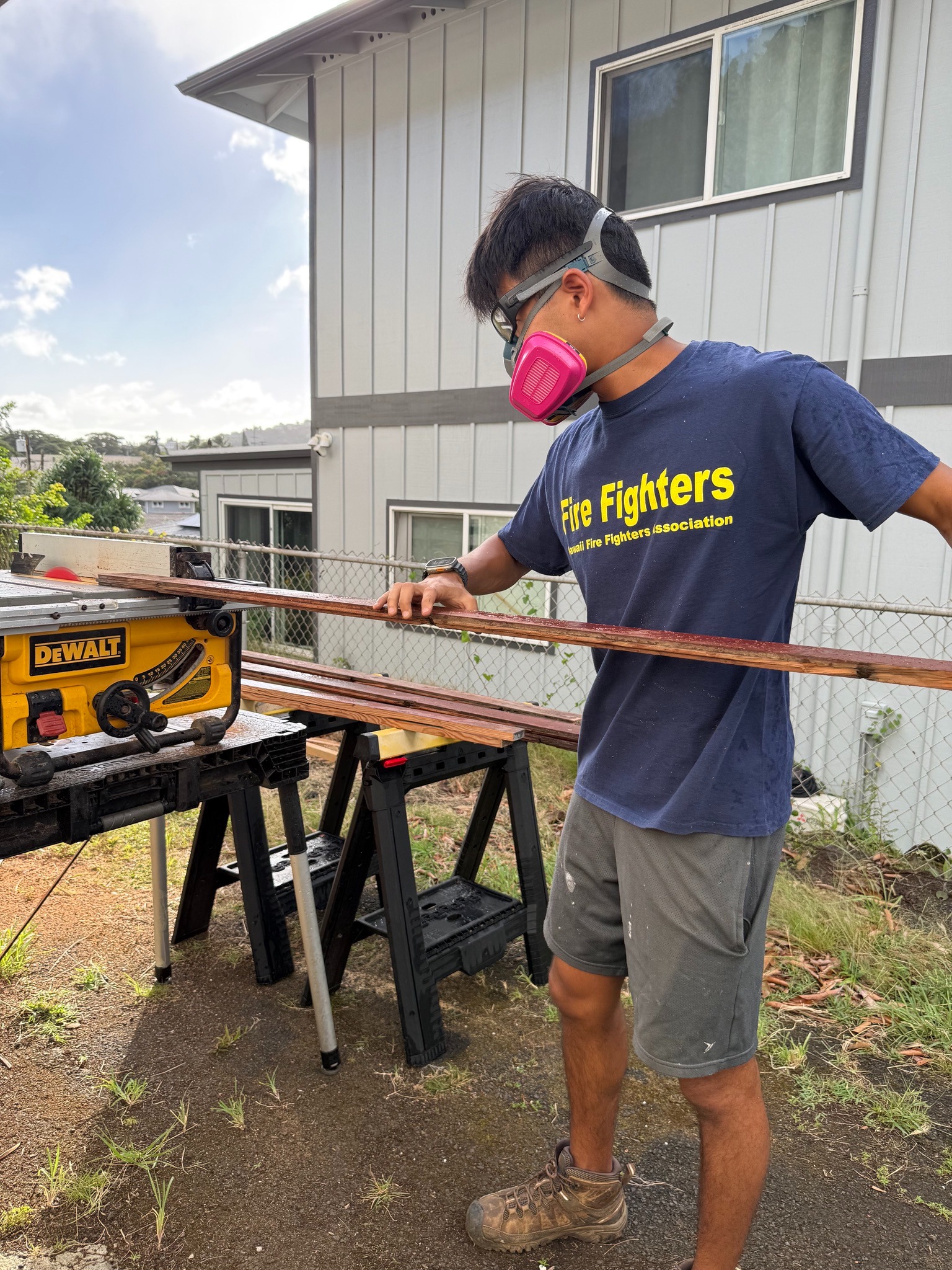 Sean Weiss working on a woodworking project outdoors